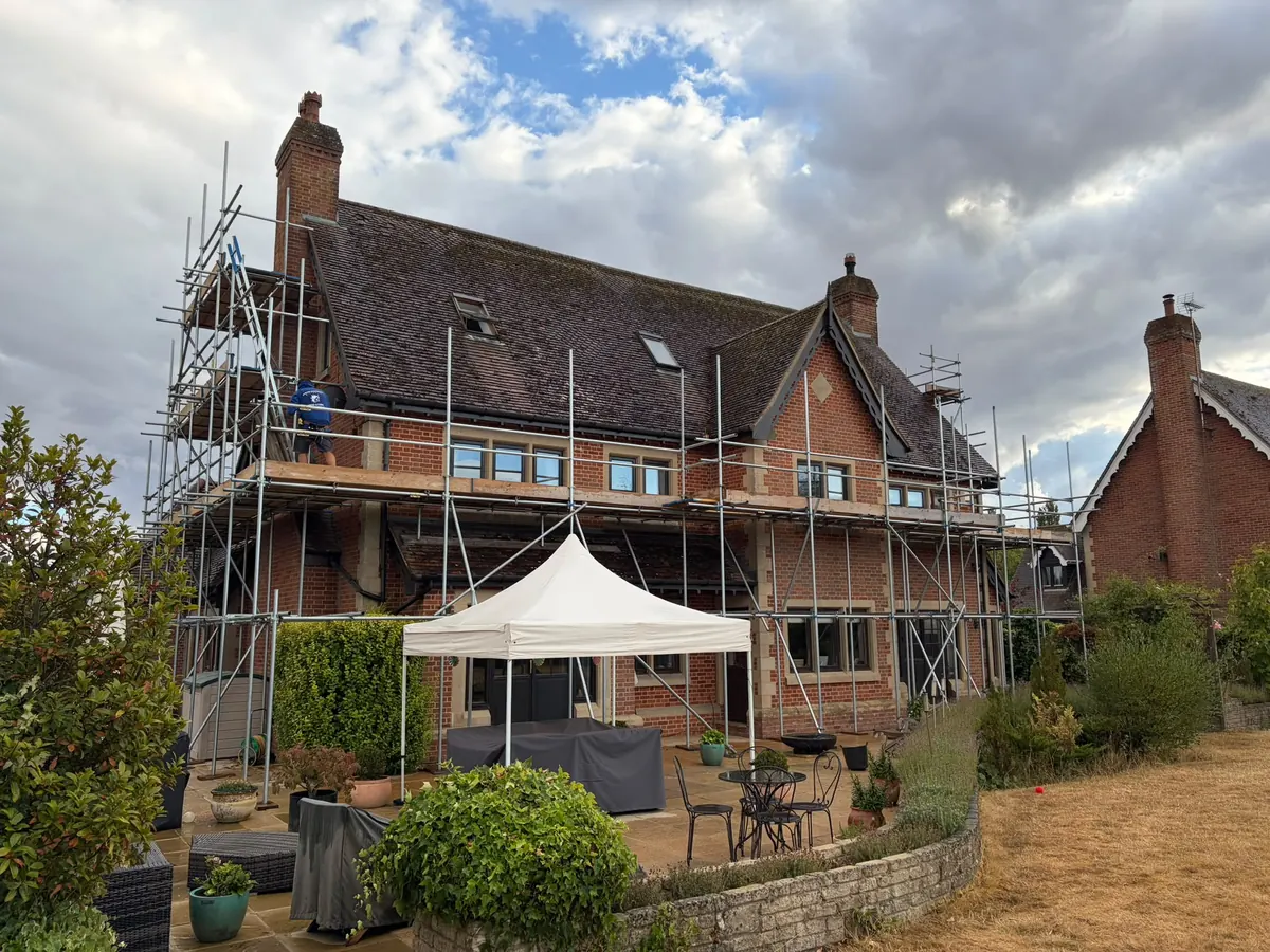 The gabled brick house from the garden