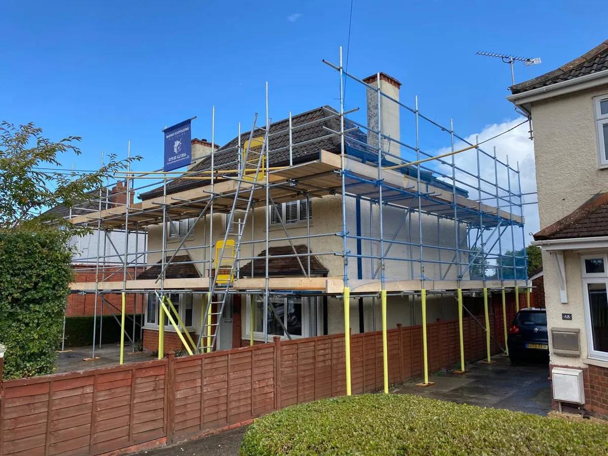 Full scaffold on a stone house